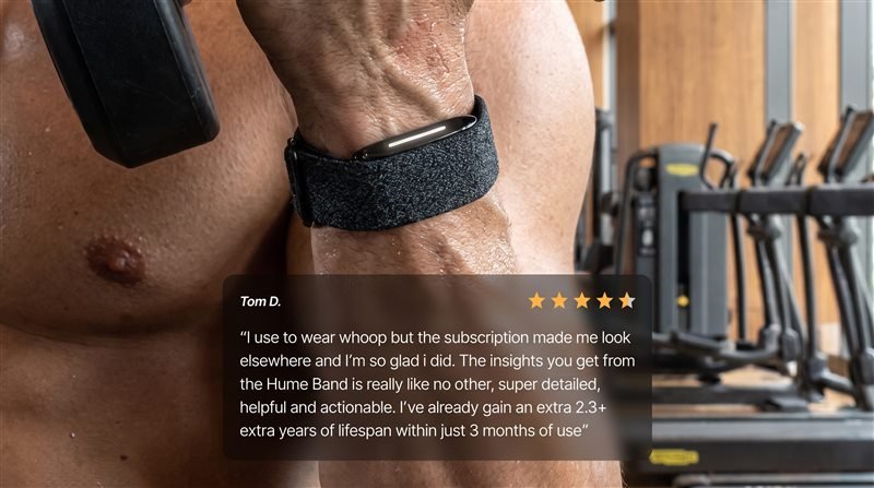 Customer wearing the Hume Band during a workout, with a five-star review from Tom D.